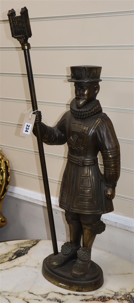 A novelty cast metal Beefeater lamp (lacking fitments) H.81cm